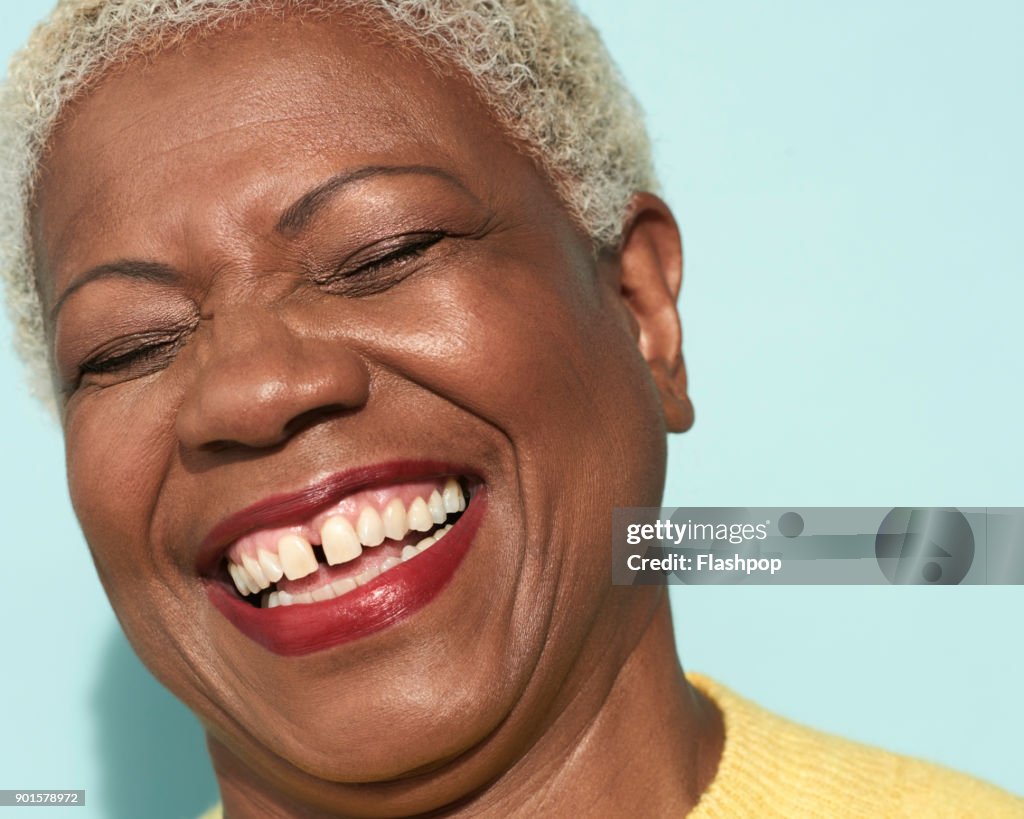 Portrait of mature woman laughing