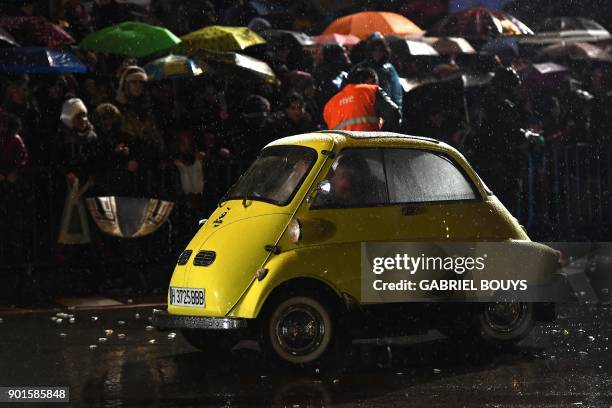 An Isetta takes part in the traditional Three Kings parade marking Epiphany in Madrid on January 5, 2018. / AFP PHOTO / GABRIEL BOUYS