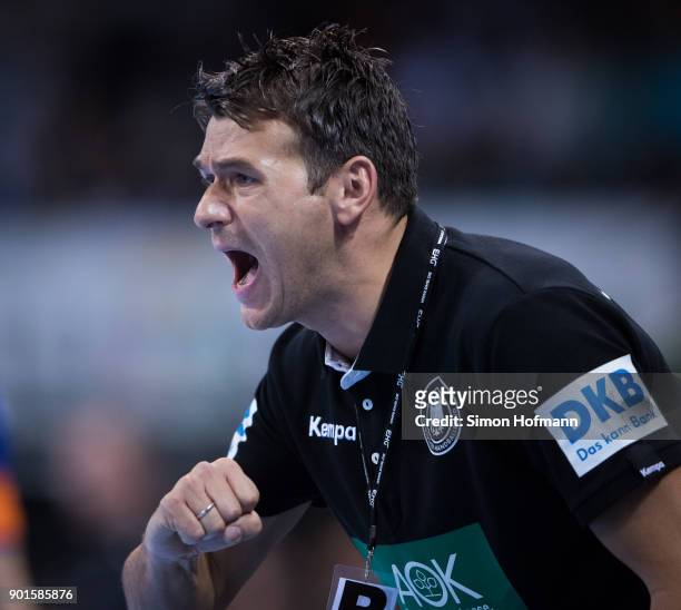 Head coach Christian Prokop of Germany celebrates during the International Handball Friendly match between Germany and Iceland at Porsche Arena on...