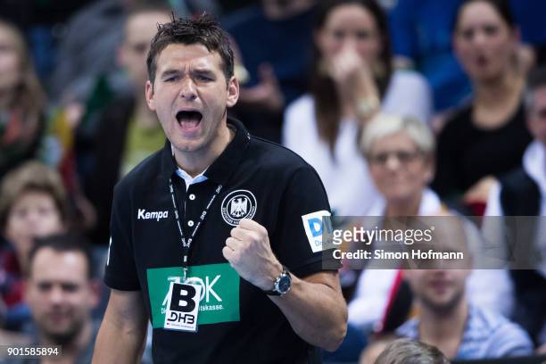 Head coach Christian Prokop of Germany celebrates during the International Handball Friendly match between Germany and Iceland at Porsche Arena on...