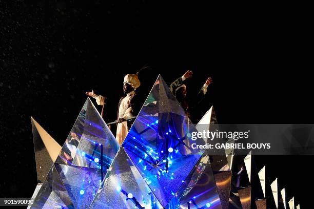 Entertainers take part in the traditional Three Kings parade marking Epiphany in Madrid on January 5, 2018.