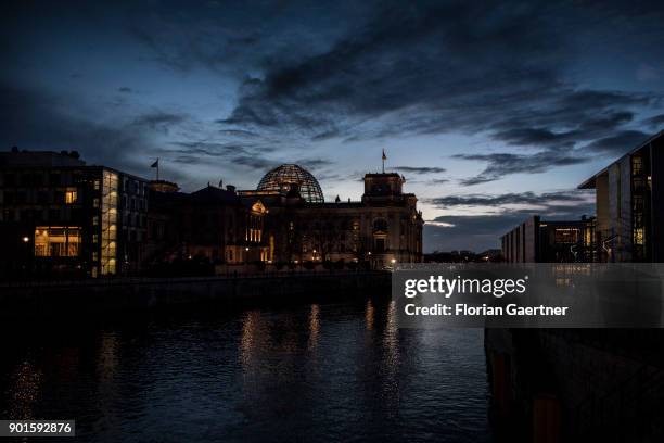 The Reichstag building is pictured during the blue hour on January 05, 2018 in Berlin, Germany.