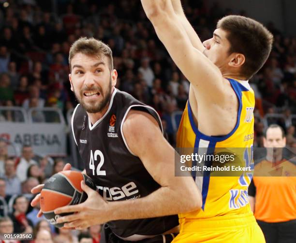 Dejan Musli, #42 of Brose Bamberg competes with Marko Todorovic, #19 of Khimki Moscow in action during the 2017/2018 Turkish Airlines EuroLeague...