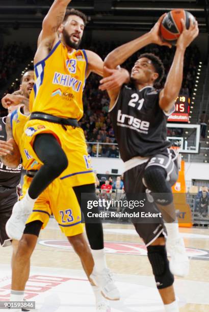 Augustine Rubit, #21 of Brose Bamberg competes with Anthony Gill, #13 of Khimki Moscow Region in action during the 2017/2018 Turkish Airlines...