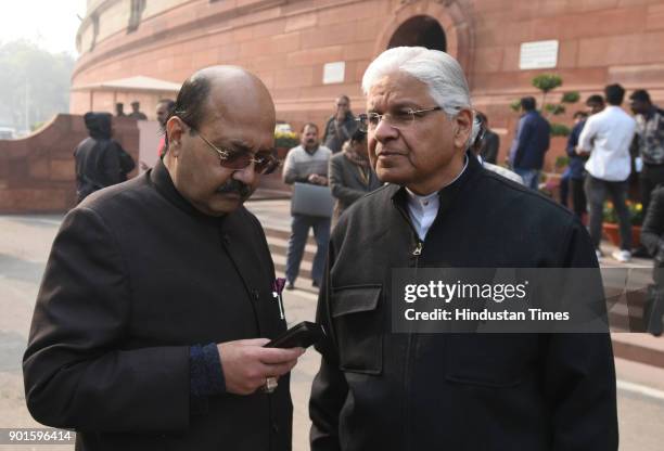 Amar Singh and Ashwani Kumar, Congress leader during the last day of the parliament winter session at Parliament House on January 5, 2018 in New...