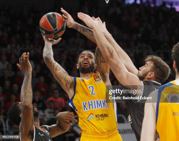 Tyler Honeycutt, #2 of Khimki Moscow Region competes with Dejan Musli, #42 of Brose Bamberg in action during the 2017/2018 Turkish Airlines...