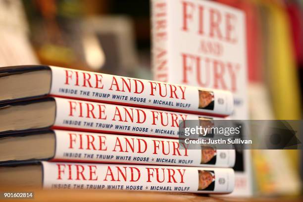 Copies of the book "Fire and Fury" by author Michael Wolff are displayed on a shelf at Book Passage on January 5, 2018 in Corte Madera, California. A...