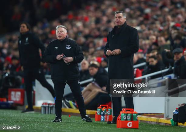 Sam Allardyce, Manager of Everton and Samy Lee assistant manager at Everton look on during the Emirates FA Cup Third Round match between Liverpool...