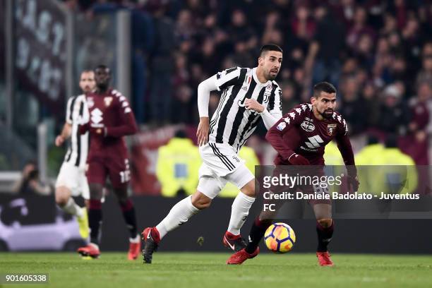 Sami Khedira and Tomas Rincon during the TIM Cup match between Juventus and Torino FC at Allianz Stadium on January 3, 20