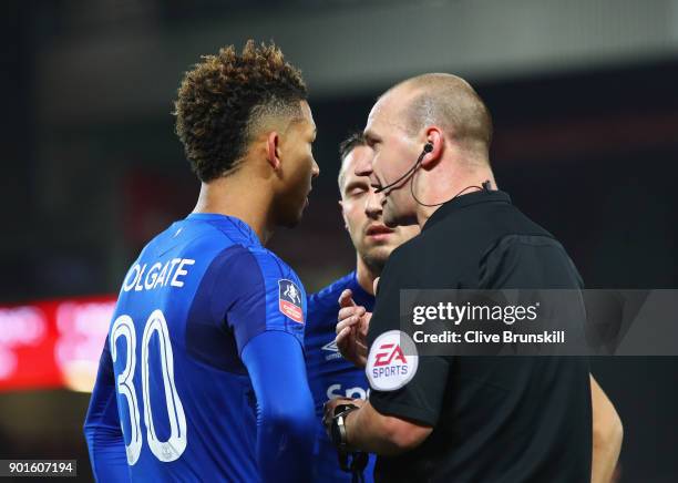 Referee Robert Madley in discussion with Mason Holgate of Everton as players clash during the Emirates FA Cup Third Round match between Liverpool and...