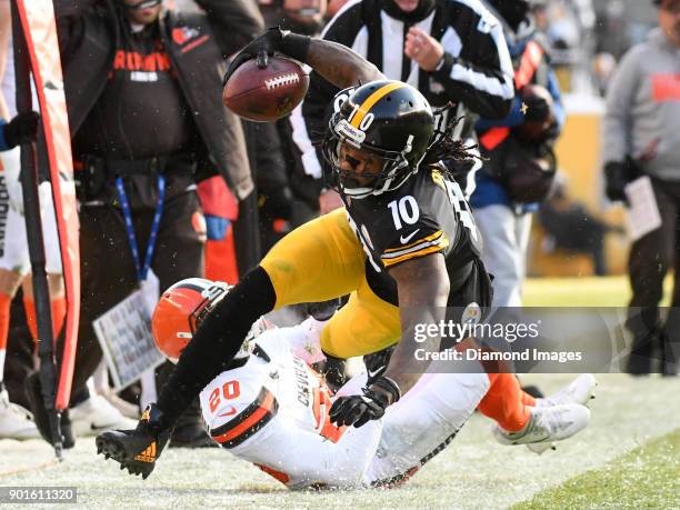 Wide receiver Martavis Bryant of the Pittsburgh Steelers is forced out of bounds by cornerback Briean Boddy-Calhoun of the Cleveland Browns in the...