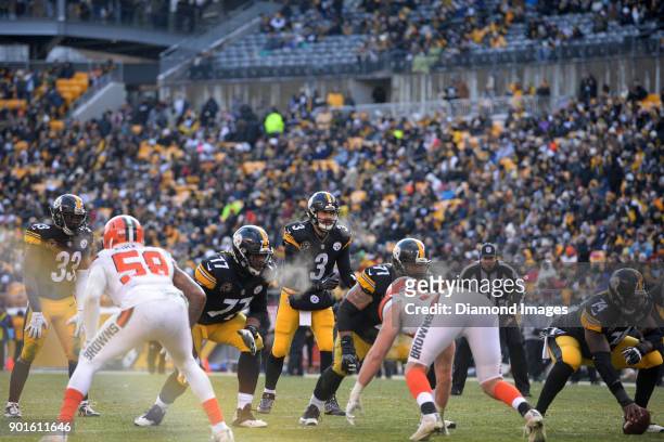 Quarterback Landry Jones of the Pittsburgh Steelers looks toward the defense as he calls for the snap in the second quarter of a game on December 31,...
