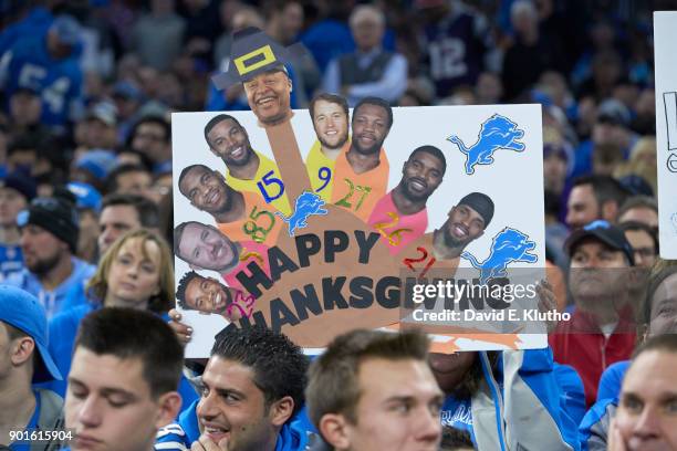 Detroit Lions fans in stands with sign that reads HAPPY THANKSGIVING during game vs Minnesota Vikings at Ford Field. Detroit, MI CREDIT: David E....