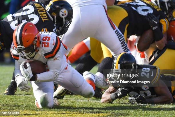 Running back Duke Johnson Jr. #29 of the Cleveland Browns scores a rushing touchdown in the second quarter of a game on December 31, 2017 against the...