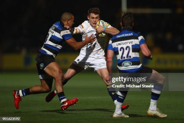 Jamie Shillcock of Worcester is tackled by Jonathan Joseph of Bath during the Aviva Premiership match between Worcester Warriors and Bath Rugby at...