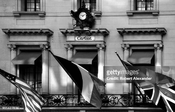 Flags fly from the Cartier Building on Fifth Avenue in New York City. Now known as the Cartier Building, the Manhattan landmark was originally the...
