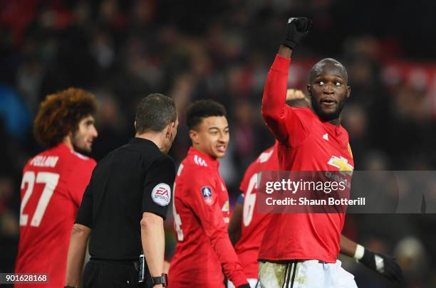 Romelu Lukaku of Manchester United celebrates as he scores their second goal with team mates during the Emirates FA Cup Third Round match between...