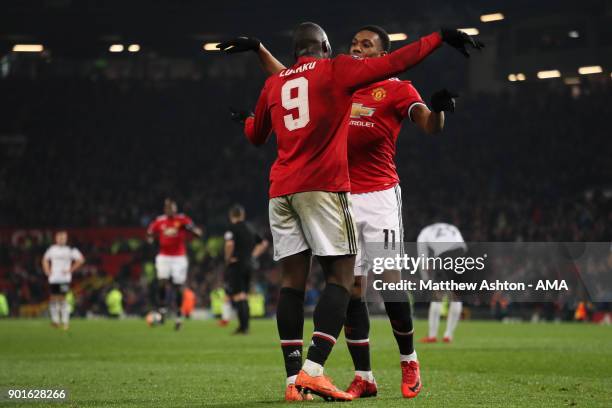 Romelu Lukaku of Manchester United celebrates scoring a goal to make the score 2-0 with Anthony Martial during the Emirates FA Cup Third Round match...