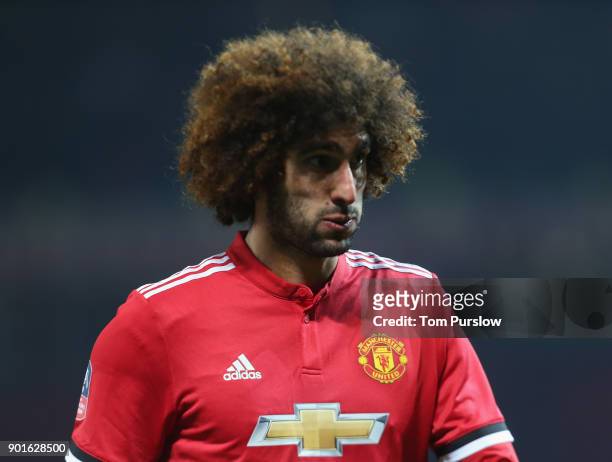 Marouane Fellaini of Manchester United walks off after the Emirates FA Cup Third Round match between Manchester United and Derby County at Old...