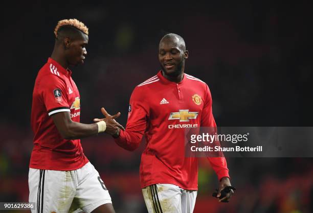 Paul Pogba and Romelu Lukaku of Manchester United celebrate victory after the Emirates FA Cup Third Round match between Manchester United and Derby...