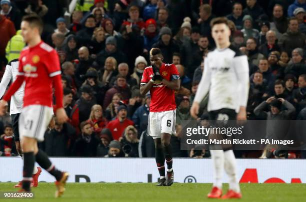 Manchester United's Paul Pogba rues a missed chance during the FA Cup, third round match at Old Trafford, Manchester.