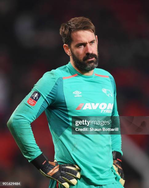 Scott Carson of Derby County looks despondent during the Emirates FA Cup Third Round match between Manchester United and Derby County at Old Trafford...