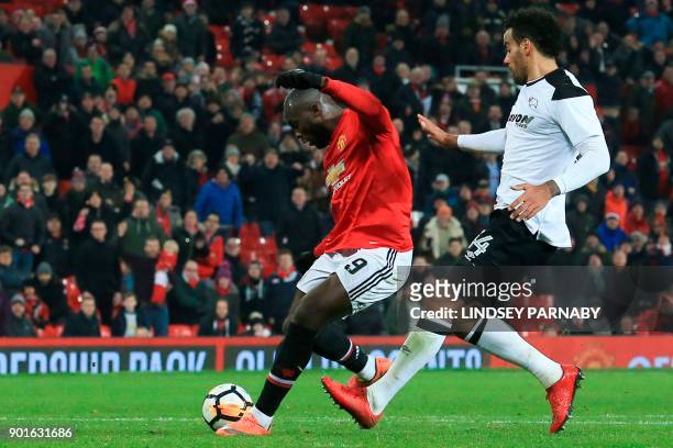 Manchester United's Belgian striker Romelu Lukaku scores their second goal during the English FA Cup third round football match between Manchester...