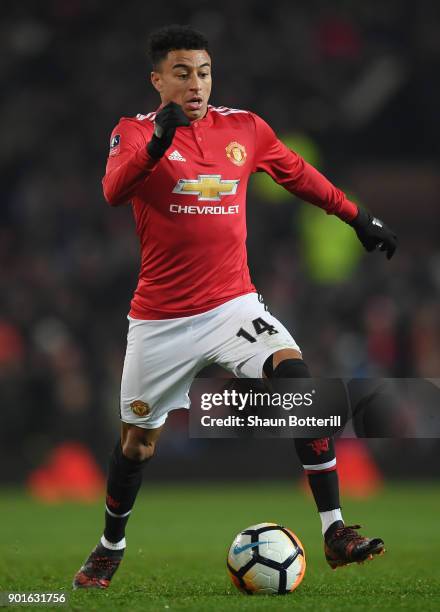 Jesse Lingard of Manchester United runs with the ball during the Emirates FA Cup Third Round match between Manchester United and Derby County at Old...