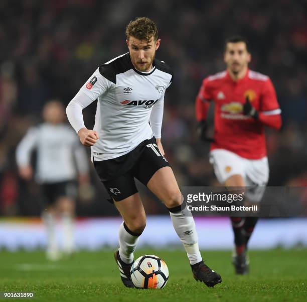 Sam Winnall of Derby County runs with the ball during the Emirates FA Cup Third Round match between Manchester United and Derby County at Old...