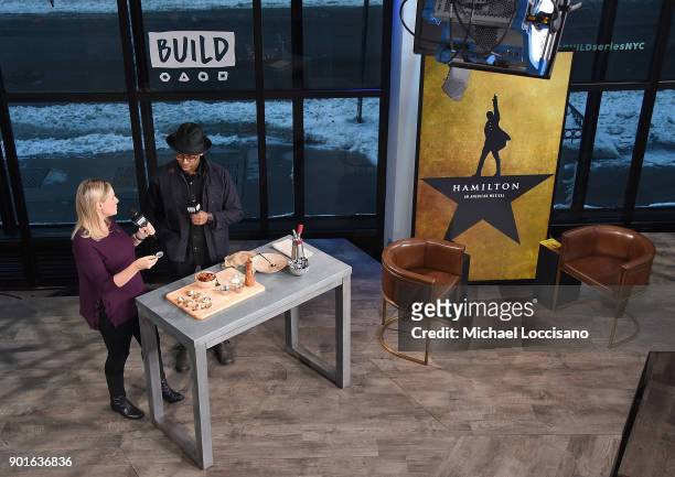 Actor Daniel Breaker does a cooking demo whie visiting Build Studio to discuss the Broadway play "Hamilton" on January 5, 2018 in New York City.