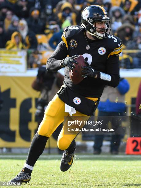 Quarterback Landry Jones of the Pittsburgh Steelers rolls out to pass in the second quarter of a game on December 31, 2017 against the Cleveland...