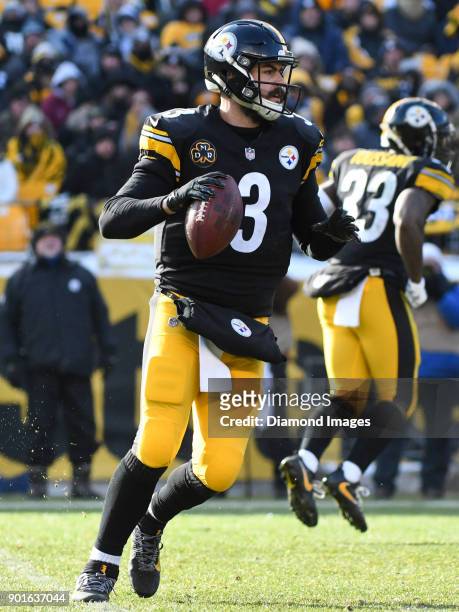 Quarterback Landry Jones of the Pittsburgh Steelers rolls out to pass in the second quarter of a game on December 31, 2017 against the Cleveland...