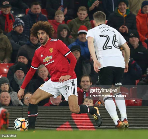 Marouane Fellaini of Manchester United in action with Jamie Hanson of Derby County during the Emirates FA Cup Third Round match between Manchester...