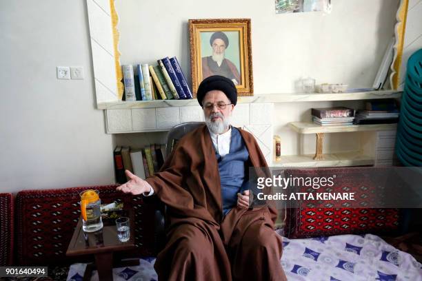 Ayatollah Seyyed Hossein Moussavi Tabrizi, a former chief prosecutor and two-time parliamentarian, speaks to AFP in an interview in the holy city of...