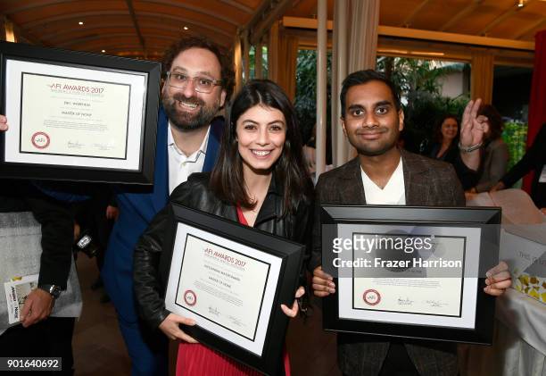 Honorees Eric Wareheim, Alessandra Mastronardi and Aziz Ansari pose with awards during 18th Annual AFI Awards at Four Seasons Hotel Los Angeles at...