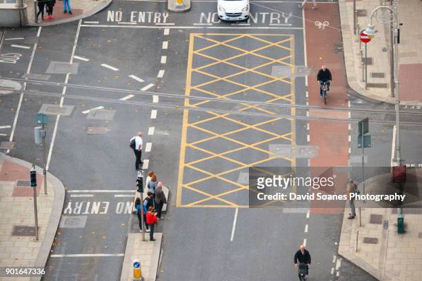 people walking along the quays in dublin, ireland - dublin aerial stock pictures, royalty-free photos & images