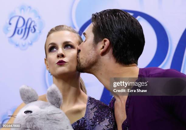 Zachary Donohue kisses Madison Hubbell in the kiss in the cry after getting their scores following the Championship Dance Short Program during Day 3...