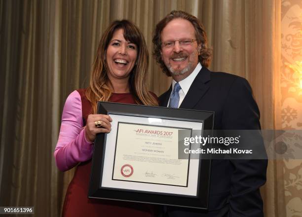 Patty Jenkins and American Film Institute president and CEO Bob Gazzale attend the 18th Annual AFI Awards at Four Seasons Hotel Los Angeles at...