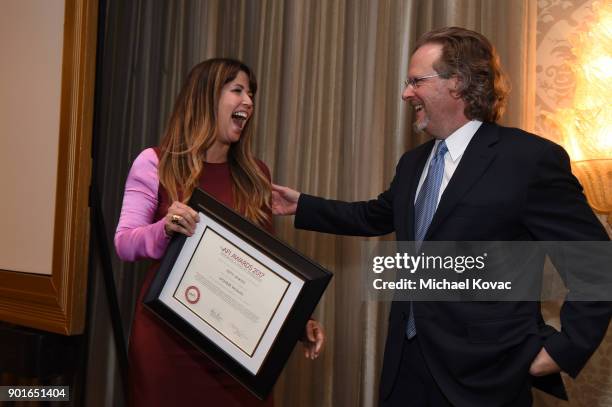 Patty Jenkins and American Film Institute president and CEO Bob Gazzale attend the 18th Annual AFI Awards at Four Seasons Hotel Los Angeles at...