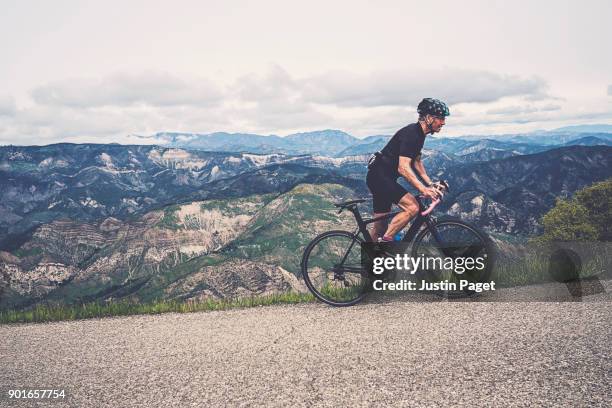 senior cyclist on hills above santa barbara - los padres national forest stock pictures, royalty-free photos & images