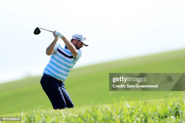 Marc Leishman of Australia plays his shot from the fourth tee during the second round of the Sentry Tournament of Champions at Plantation Course at...