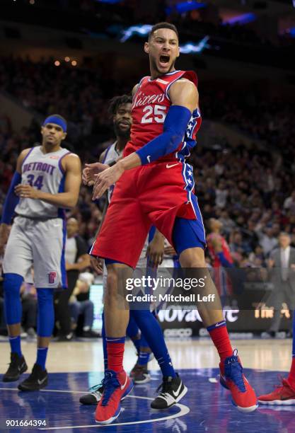 Ben Simmons of the Philadelphia 76ers reacts after dunking the ball against the Detroit Pistons in the second quarter at the Wells Fargo Center on...