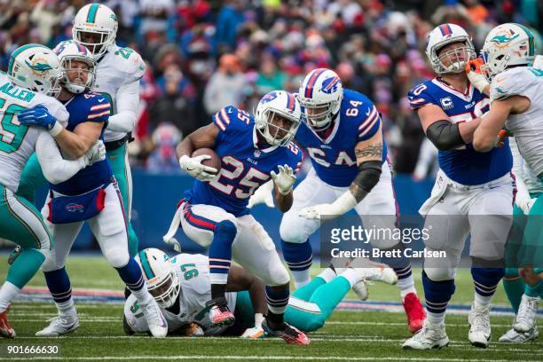 LeSean McCoy of the Buffalo Bills carries the ball for a career rushing yards total above ten thousand yards during the second quarter against the...