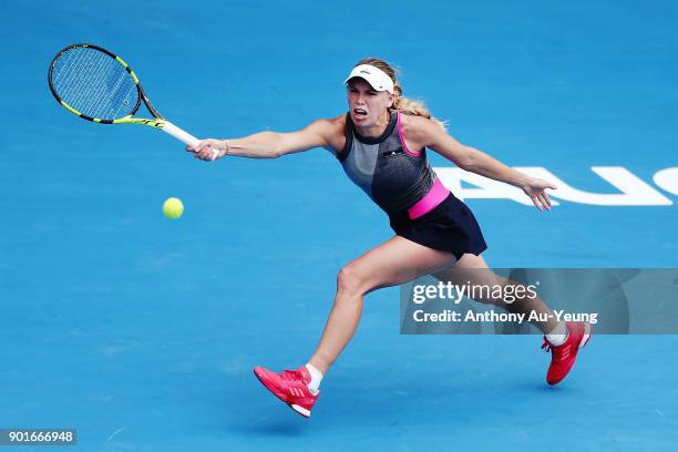 Caroline Wozniacki of Denmark returns a shot in her quarter final match against Sofia Kenin of USA during day six of the ASB Women's Classic at ASB...