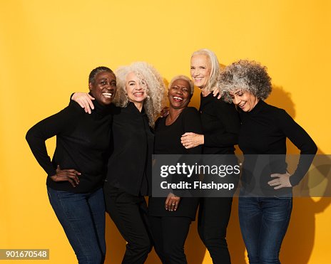 Portrait of five women laughing and having fun Portrait of five women laughing and having fun