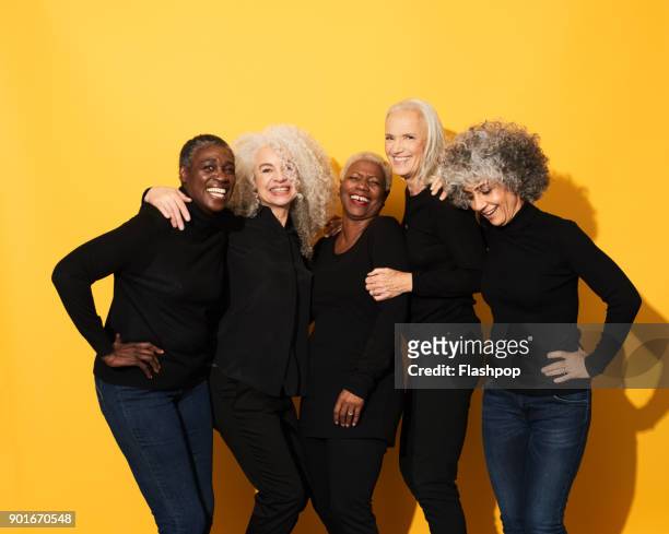 portrait of five women laughing and having fun - five people stock pictures, royalty-free photos & images