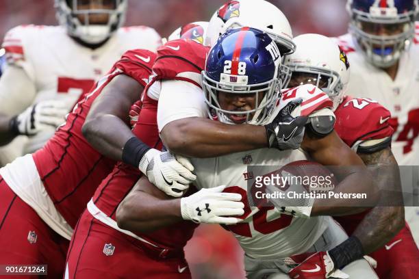 Running back Paul Perkins of the New York Giants rushes the football against the Arizona Cardinals during the second half of the NFL game at the...
