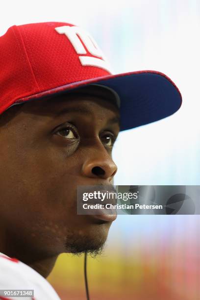 Quarterback Geno Smith of the New York Giants watches from the bench during the second half of the NFL game against the Arizona Cardinals at the...