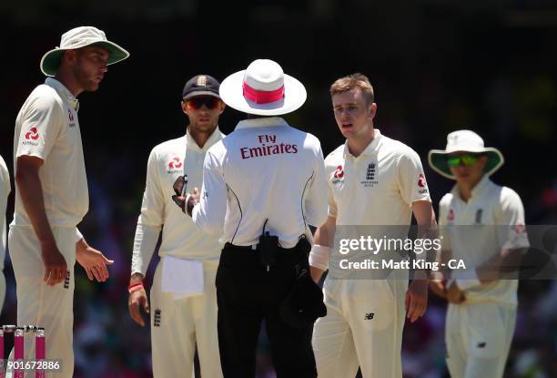 Mason Crane of England argues with an umpire after a no ball was called on a DRS decision during day three of the Fifth Test match in the 2017/18...