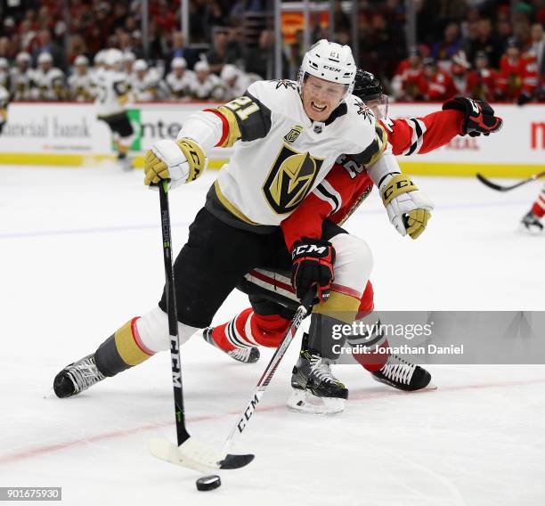 Cody Eakin of the Vegas Golden Knights is pressured by Gustav Forsling of the Chicago Blackhawks at the United Center on January 5, 2018 in Chicago,...